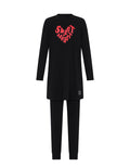 Black teen tunic with long sleeves and graphic heart text, paired with black leggings
