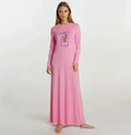 Pink pull-on nightgown with long sleeves and floral perfume bottle print