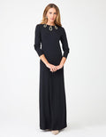 Black pull-on nightgown with gold-tipped keyhole neckline trim, long sleeves, maxi length