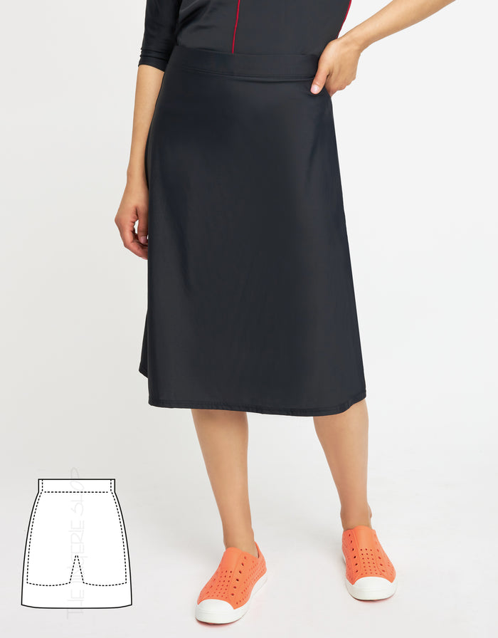 Black quick-dry swim skirt with attached shorts, knee-length