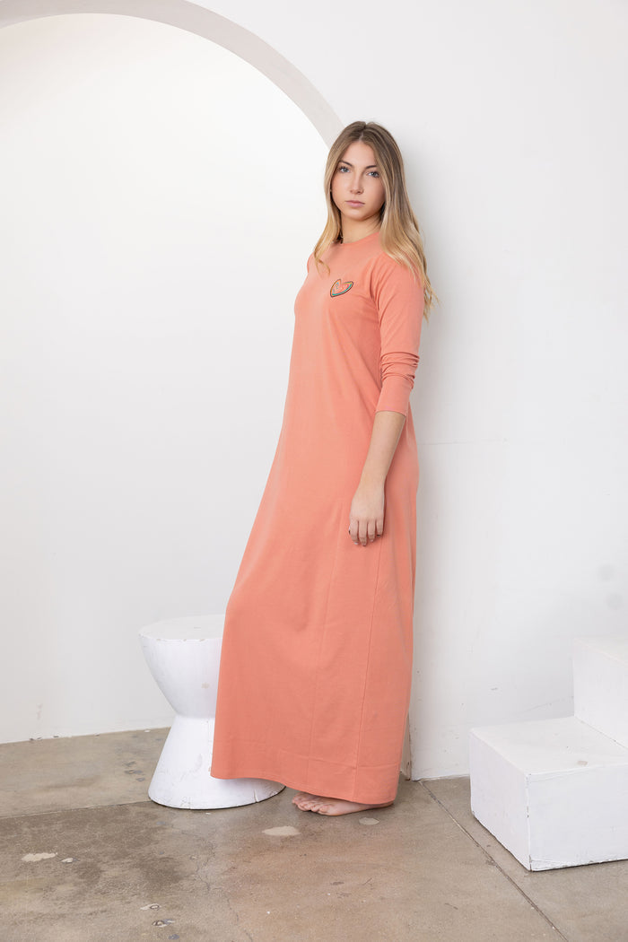 Peach teen nightgown with long sleeves and open scoop neckline