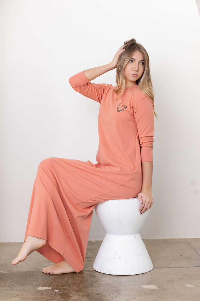 Peach teen nightgown with long sleeves and small heart graphic on chest