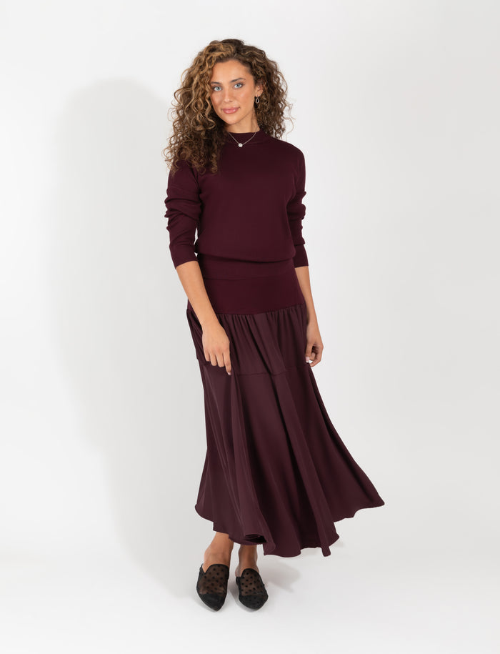 Maroon fitted sweater and flowing midi skirt set, long sleeves, draped skirt