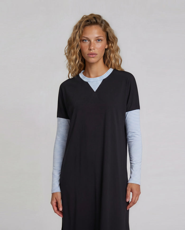 Black pull on nightgown with contrasting  light blue long sleeves and neck trim.