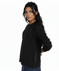Black long-sleeve crewneck top with front seam detailing
