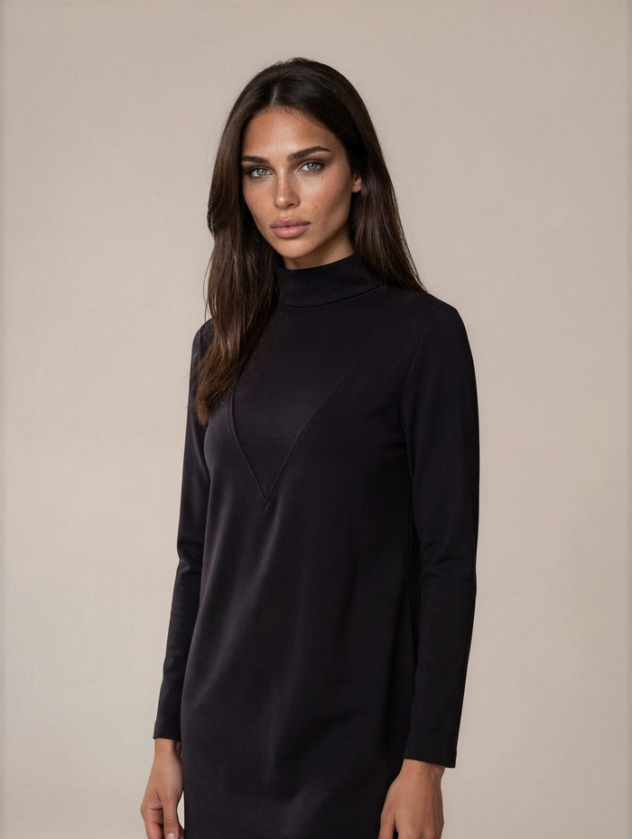 Black long sleeve jersey maxi dress with v-cut insert and mock turtleneck collar.