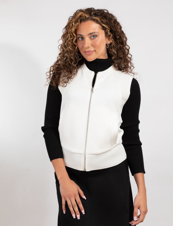 Ivory sleeveless zip-front knit vest with stand collar
